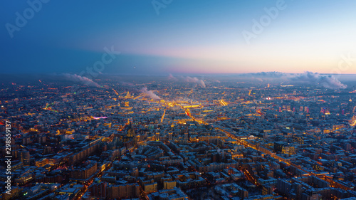Beautiful aerial view to Moscow city on the sunset. Picturesque motion of the evening metropolis wit